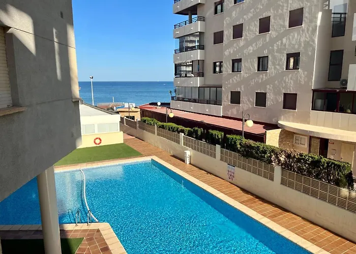 Apartment On The Beach With Parking And Pool